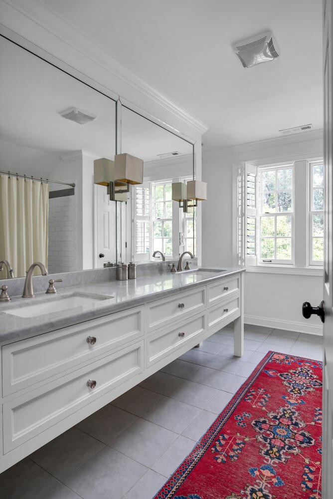 3904 Valley Road Nashville, TN 37205 - Photo 41 of 67 a spacious bathroom with double vanity and a large mirror