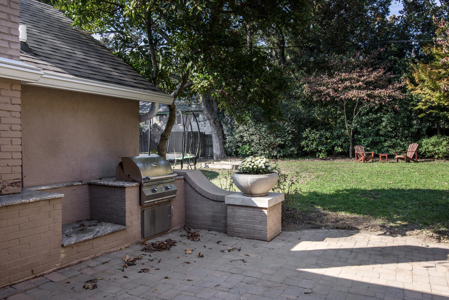 3904 Valley Road Nashville, TN 37205 - Photo 51 of 67 a view of a backyard with furniture and a garden