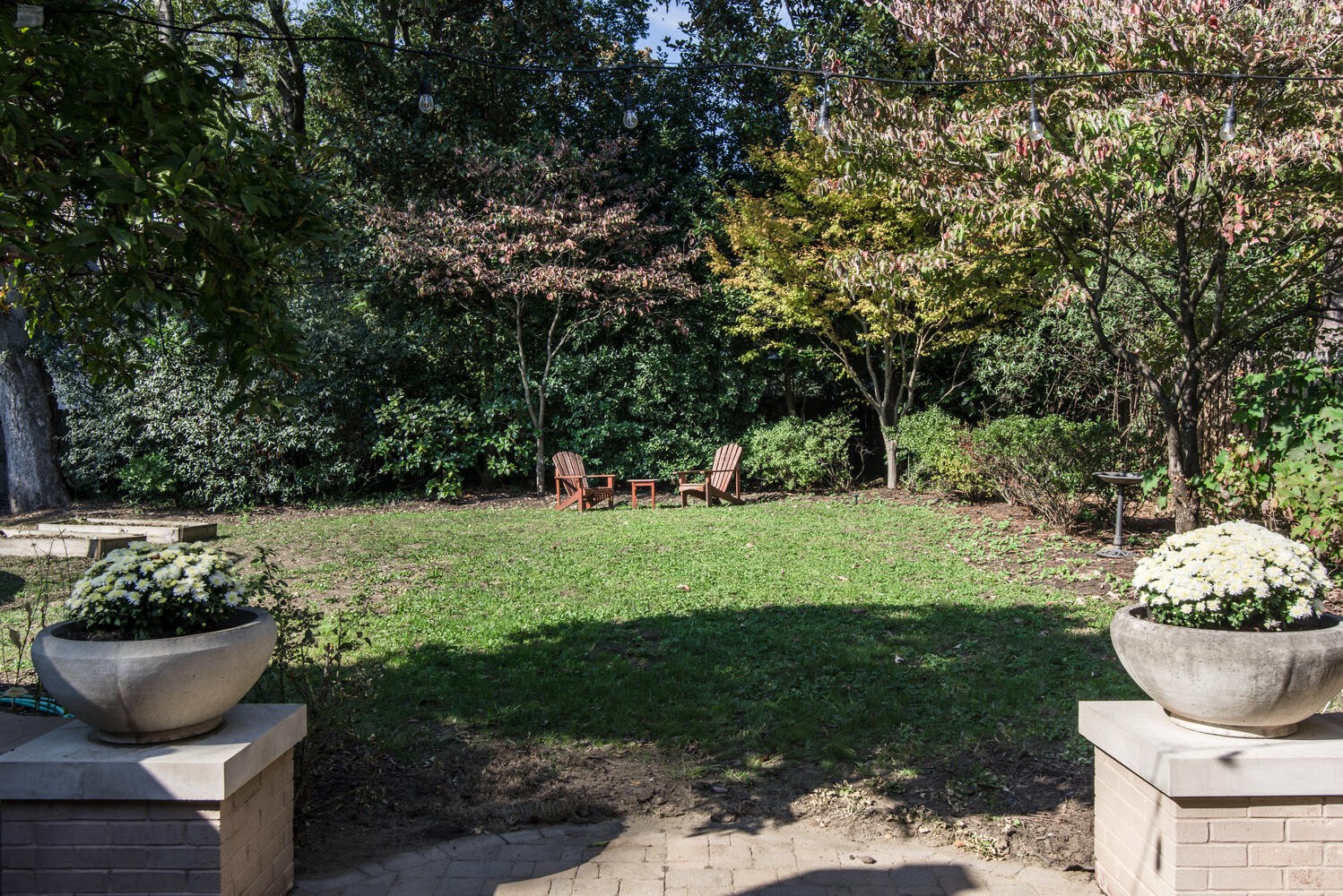 3904 Valley Road Nashville, TN 37205 - Photo 52 of 67 a view of a backyard house and garden
