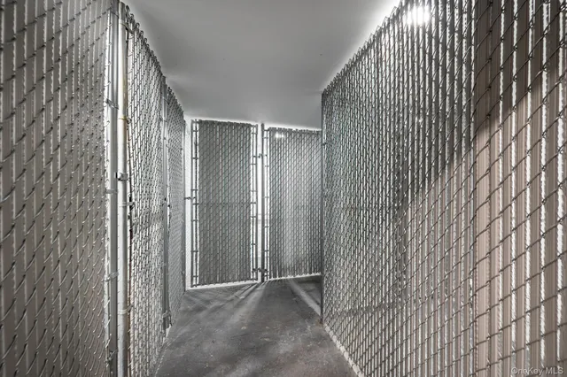 a view of an empty room with balcony