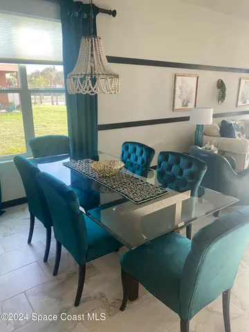 a living room with furniture and window