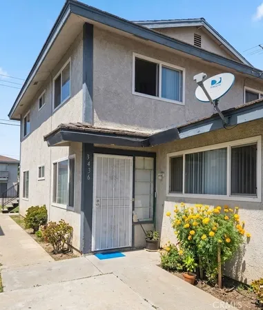 a front view of a house with a garage