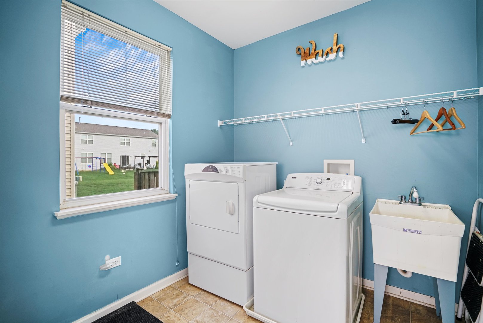 351 Claridge Circle Bolingbrook, IL 60440 - Photo 13 of 32 a utility room with dryer and washer