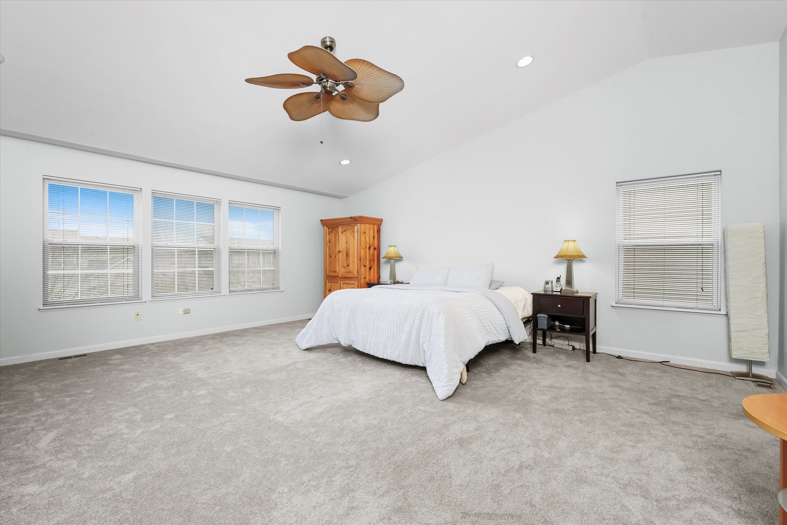 351 Claridge Circle Bolingbrook, IL 60440 - Photo 16 of 32 a bedroom with a bed and a chandelier