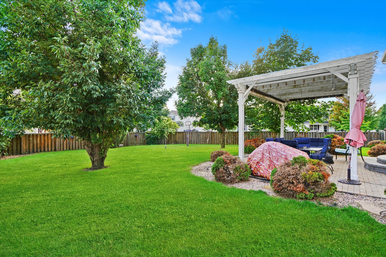 351 Claridge Circle Bolingbrook, IL 60440 - Photo 27 of 32 a view of a chair and table in backyard of the house