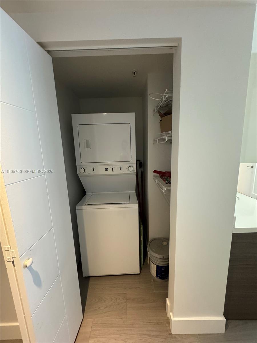 1010 Southwest 2nd Avenue, Unit 910 Miami, FL 33130 - Photo 15 of 32 a utility room with a washer and dryer