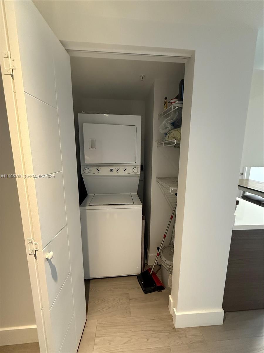 1010 Southwest 2nd Avenue, Unit 910 Miami, FL 33130 - Photo 17 of 32 a utility room with a washer and dryer