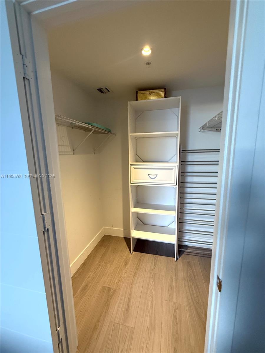 1010 Southwest 2nd Avenue, Unit 910 Miami, FL 33130 - Photo 22 of 32 a view of an empty walk in closet