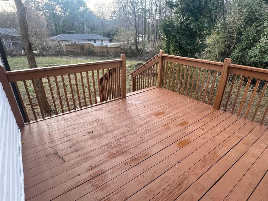 1753 Lee Street Decatur, GA 30035 - Photo 15 of 17 a balcony with wooden floor