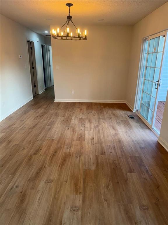 1753 Lee Street Decatur, GA 30035 - Photo 4 of 17 wooden floor in an empty room