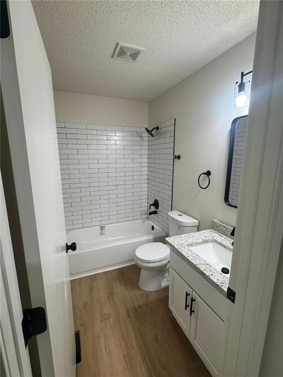 1753 Lee Street Decatur, GA 30035 - Photo 5 of 17 a bathroom with a granite countertop sink toilet and shower