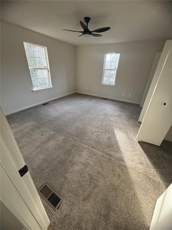 1753 Lee Street Decatur, GA 30035 - Photo 7 of 17 a view of an empty room and window
