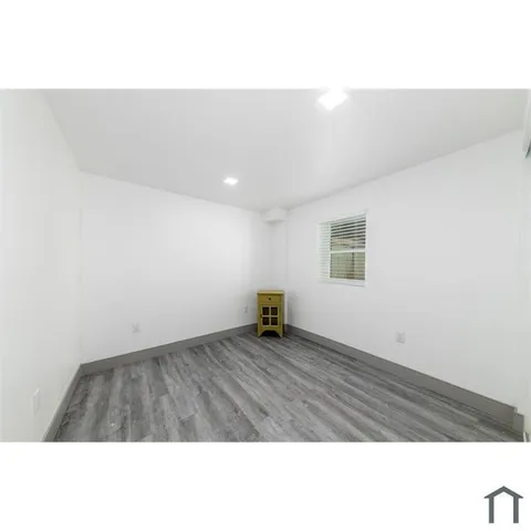 a kitchen with a sink and a window