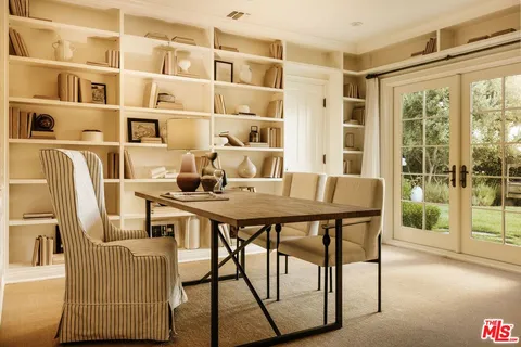 a outdoor living space with furniture and garden view