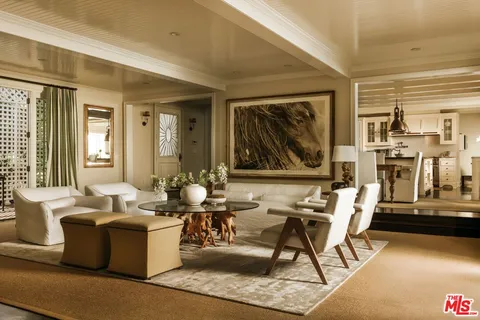 a living room with a couch and a table