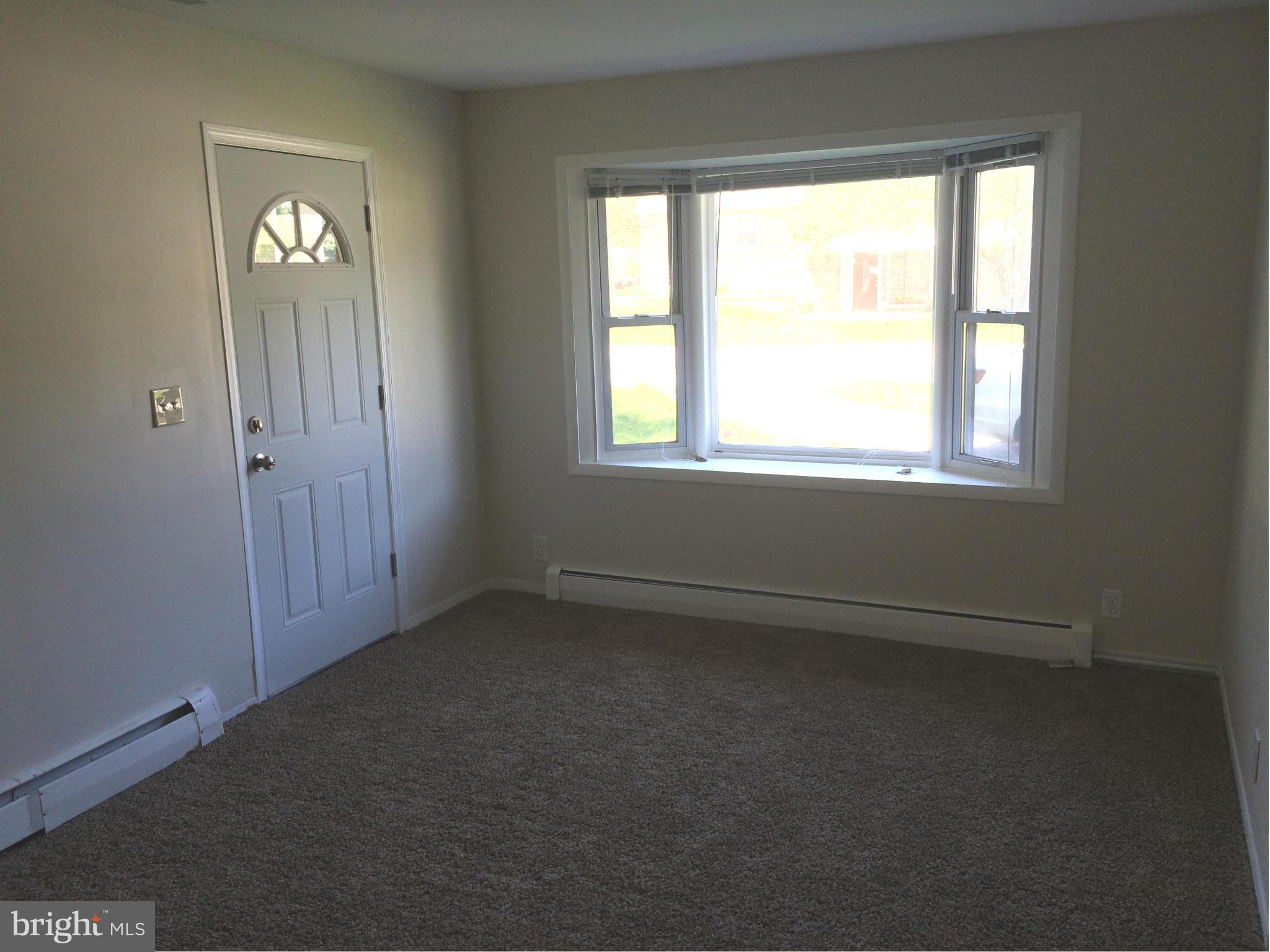 8045 Jumpers Hole Road Pasadena, MD 21122 - Photo 5 of 30 Living Room