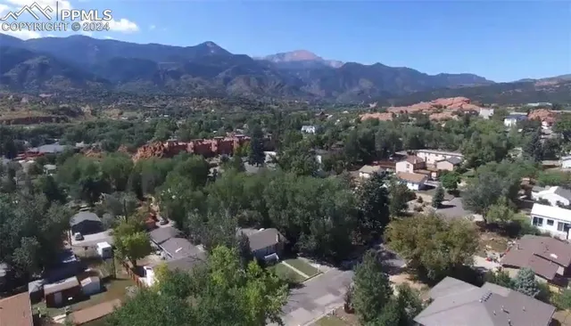 an aerial view of residential house and outdoor space