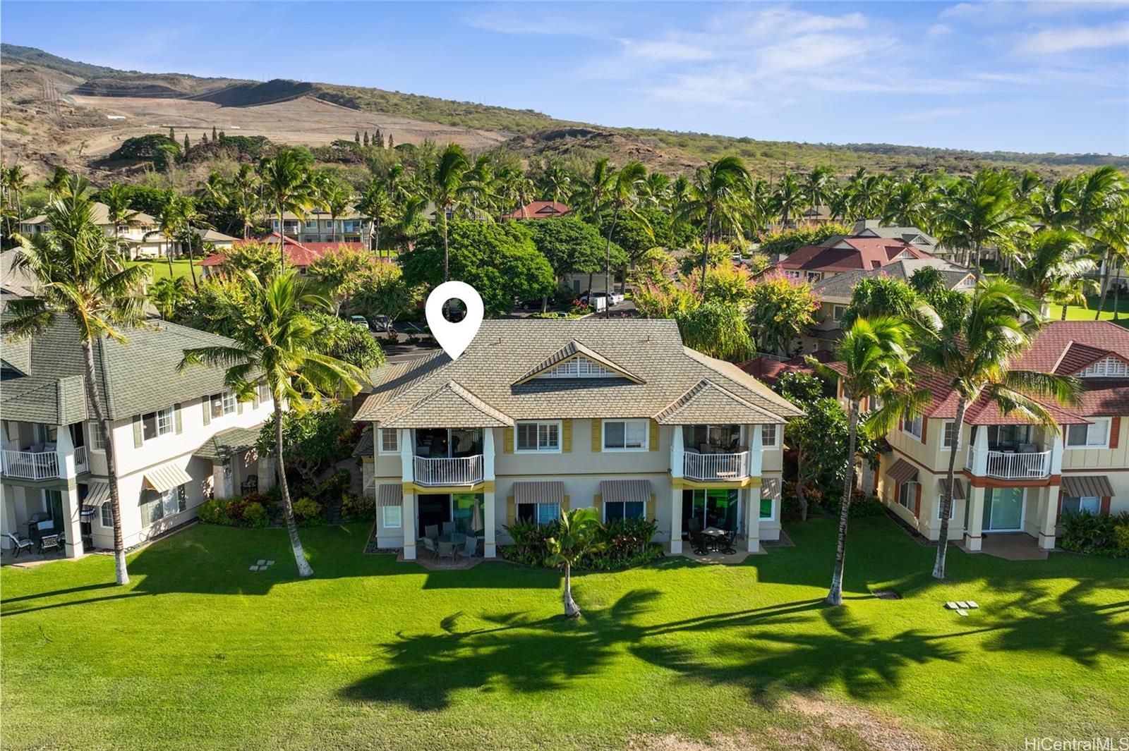 92-1001 Aliinui Drive, Unit 25C Kapolei, HI 96707 - Photo 18 of 25 a front view of a house with a yard