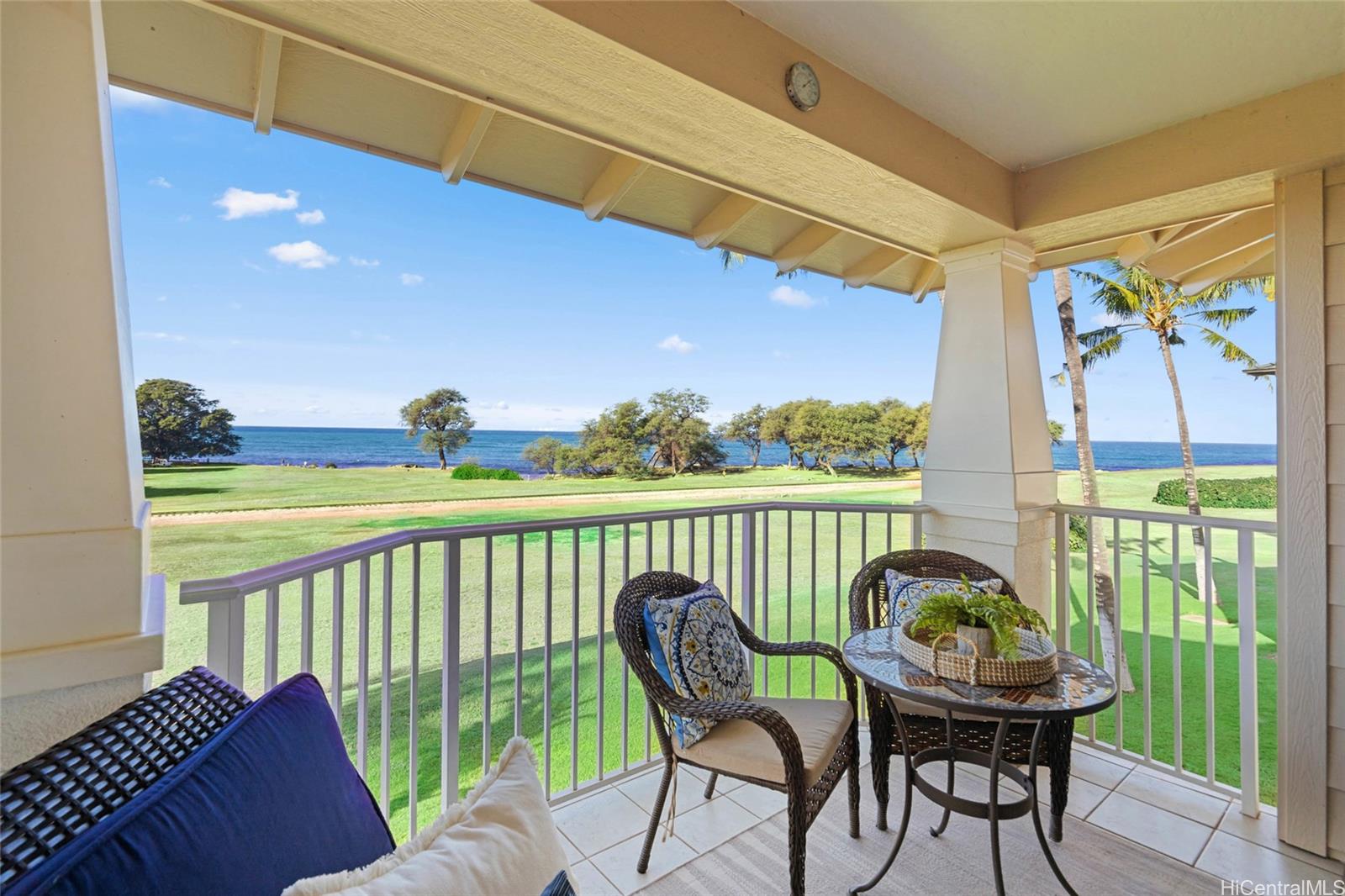 92-1001 Aliinui Drive, Unit 25C Kapolei, HI 96707 - Photo 23 of 25 a view of a balcony with furniture and garden