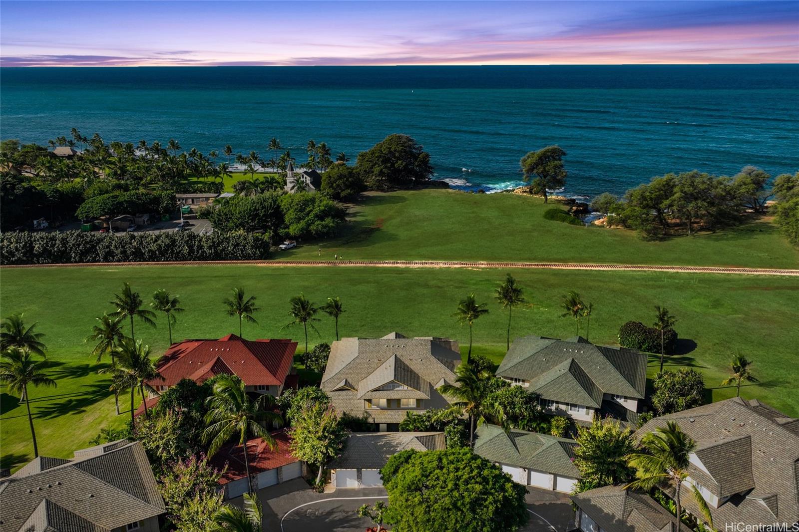 92-1001 Aliinui Drive, Unit 25C Kapolei, HI 96707 - Photo 24 of 25 an aerial view of a houses with a lake view