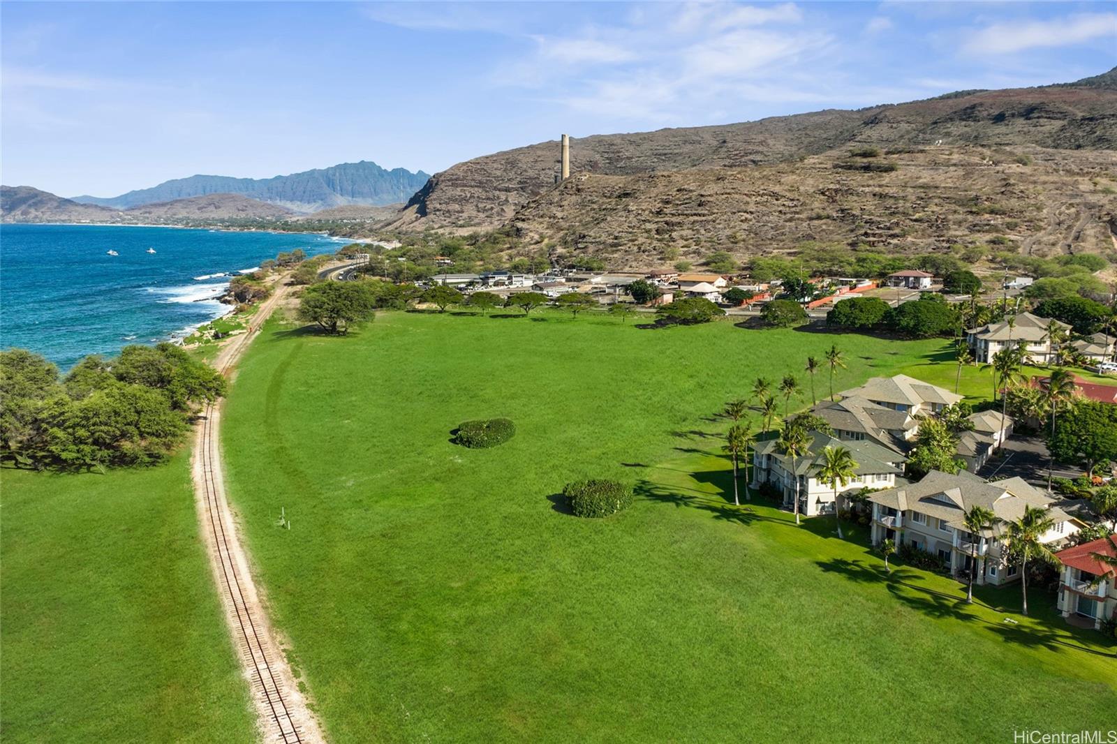 92-1001 Aliinui Drive, Unit 25C Kapolei, HI 96707 - Photo 25 of 25 a view of a lush green hillside and houses