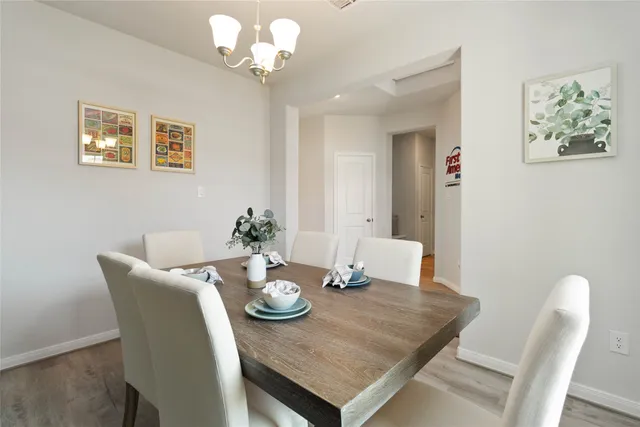 a kitchen with stainless steel appliances granite countertop a sink dishwasher and refrigerator