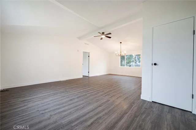 a kitchen with stainless steel appliances granite countertop a stove and a refrigerator