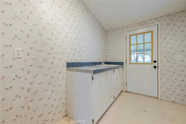 a view of outdoor space with trees all around