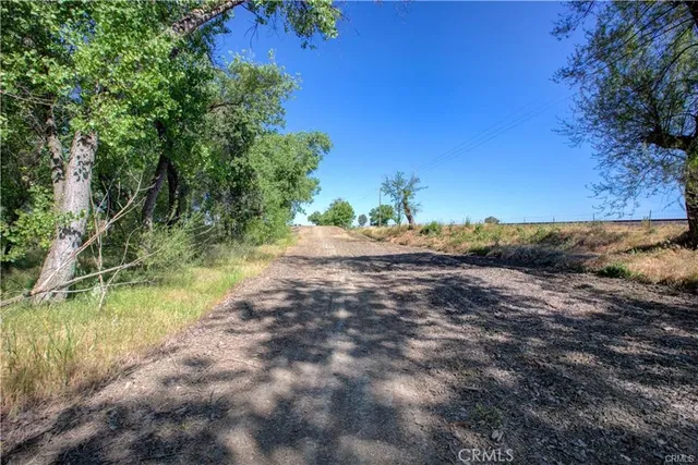 a view of a playground with basketball court