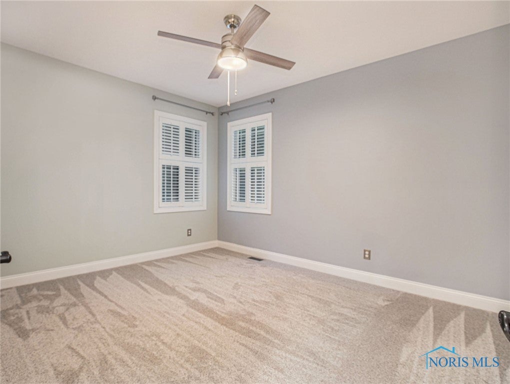10879 Reed Road Whitehouse, OH 43571 - Photo 26 of 44 main level bedroom