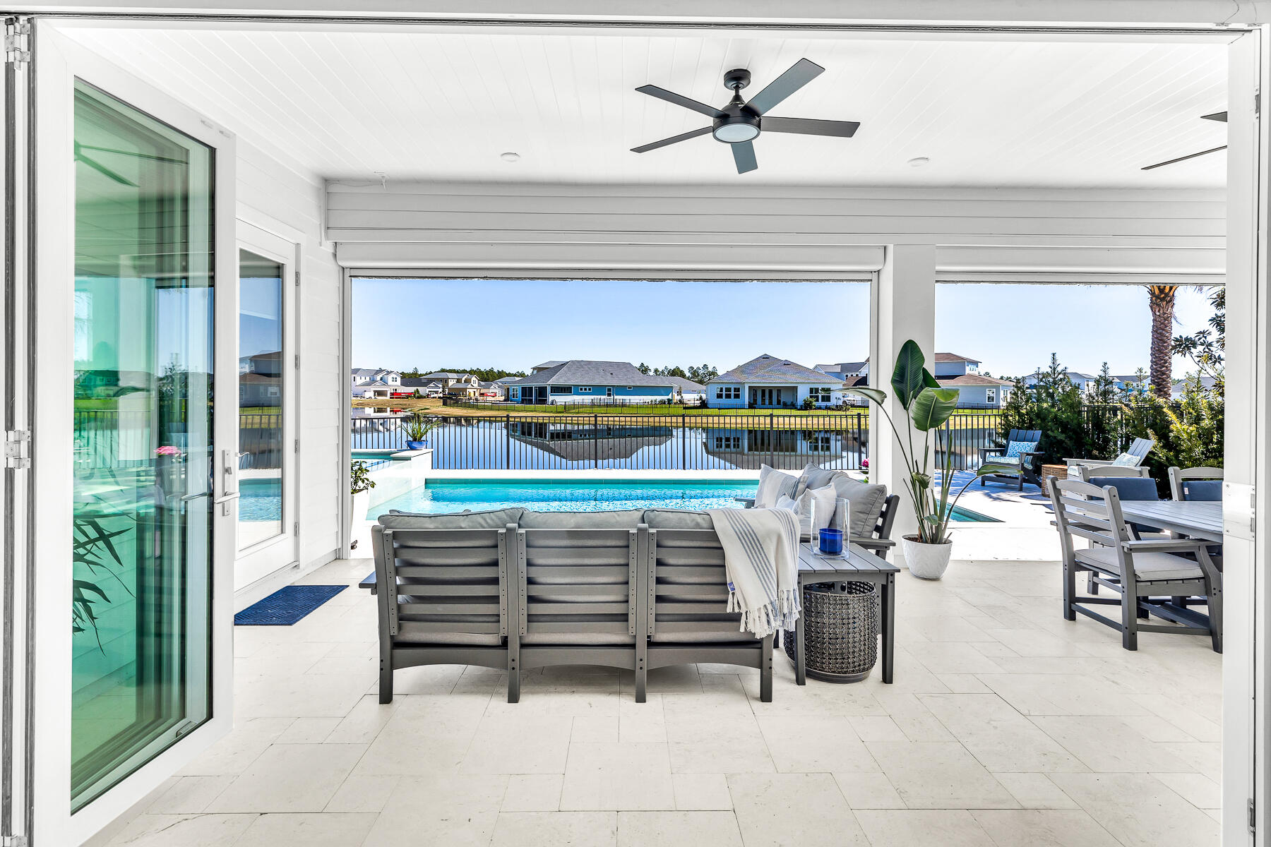 80 River Rise Way Inlet Beach Inlet Beach, FL 32461 - Photo 16 of 46 a outdoor living space with furniture and a potted plant