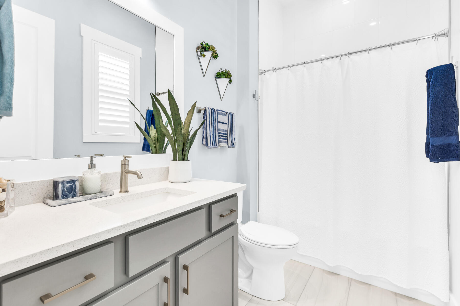 80 River Rise Way Inlet Beach Inlet Beach, FL 32461 - Photo 29 of 46 a bathroom with a granite countertop sink a toilet and a mirror