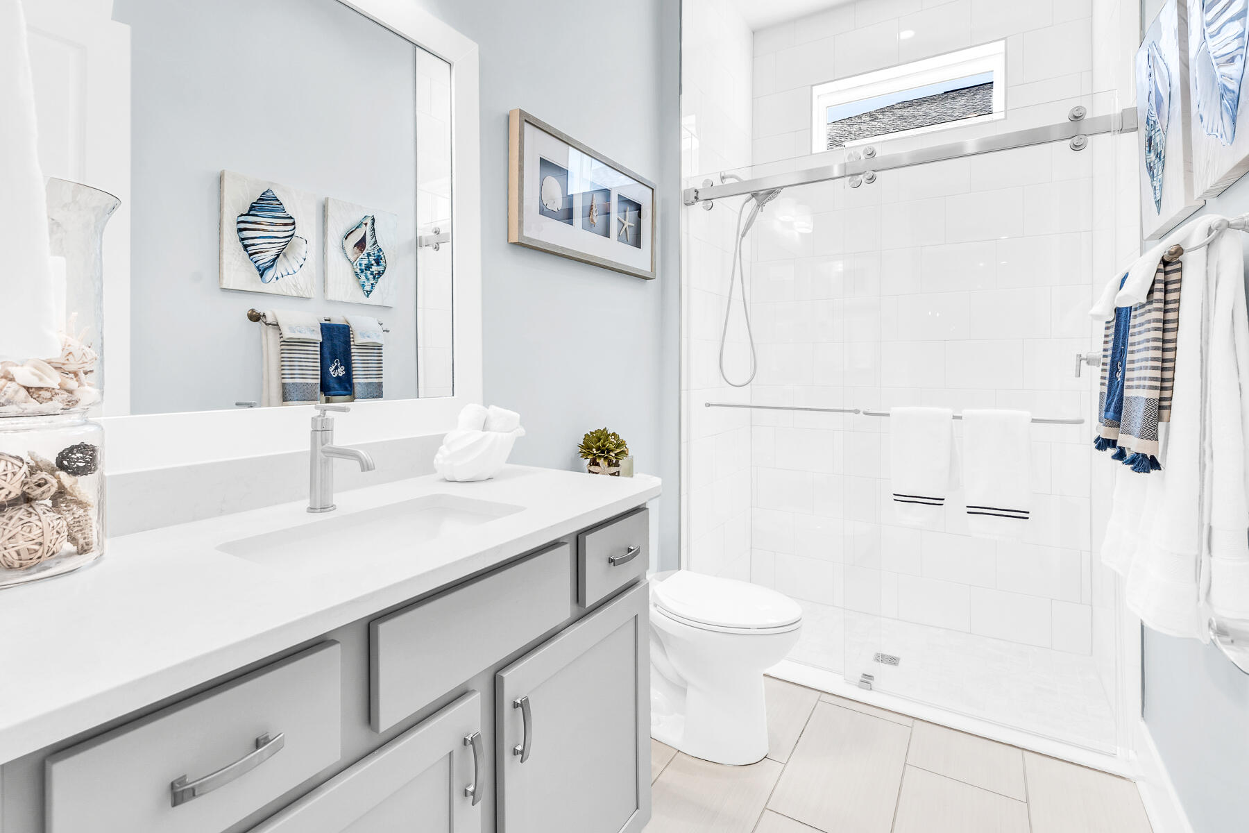80 River Rise Way Inlet Beach Inlet Beach, FL 32461 - Photo 31 of 46 a bathroom with a sink toilet a mirror and shower