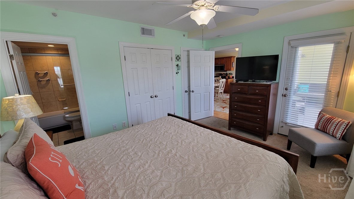 18 Silver Avenue, Unit 4 Tybee Island, GA 31328 - Photo 11 of 20 Master Bedroom - open to front porch