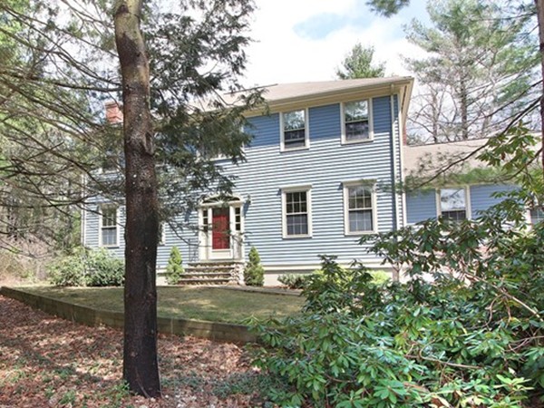6 Page Farm Road Lincoln, MA 01773 - Photo 1 of 21 a front view of a house with garden
