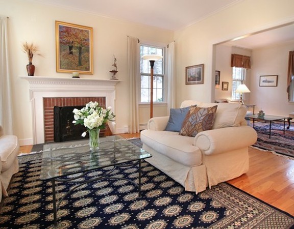 6 Page Farm Road Lincoln, MA 01773 - Photo 4 of 21 a living room with a couch and a fireplace