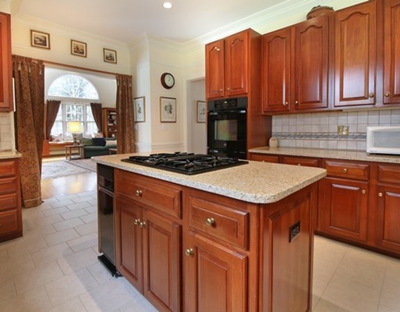6 Page Farm Road Lincoln, MA 01773 - Photo 7 of 21 a kitchen with granite countertop a sink stove and cabinets