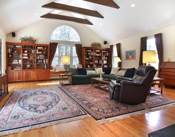 6 Page Farm Road Lincoln, MA 01773 - Photo 8 of 21 a living room with furniture and a flat screen tv