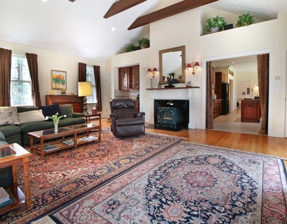 6 Page Farm Road Lincoln, MA 01773 - Photo 9 of 21 a living room with furniture and a fireplace