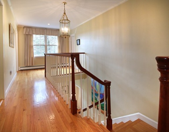 6 Page Farm Road Lincoln, MA 01773 - Photo 10 of 21 a view of entryway with wooden floor and windows