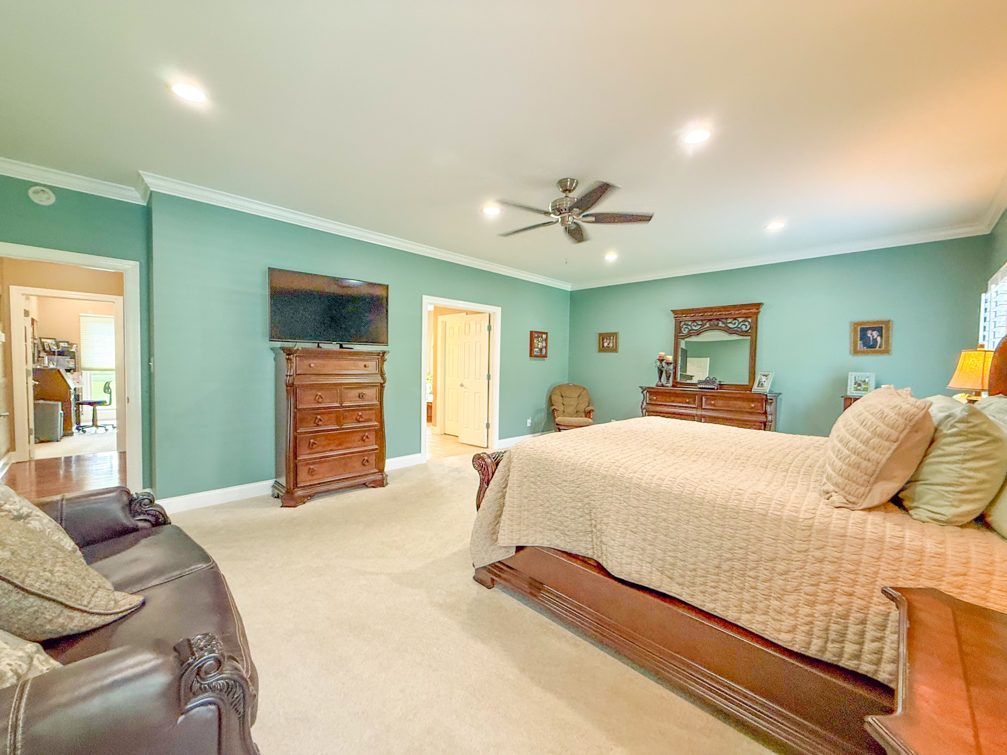275 Crescentview Road Pulaski, TN 38478 - Photo 23 of 62 a bedroom with a large bed and ceiling fan