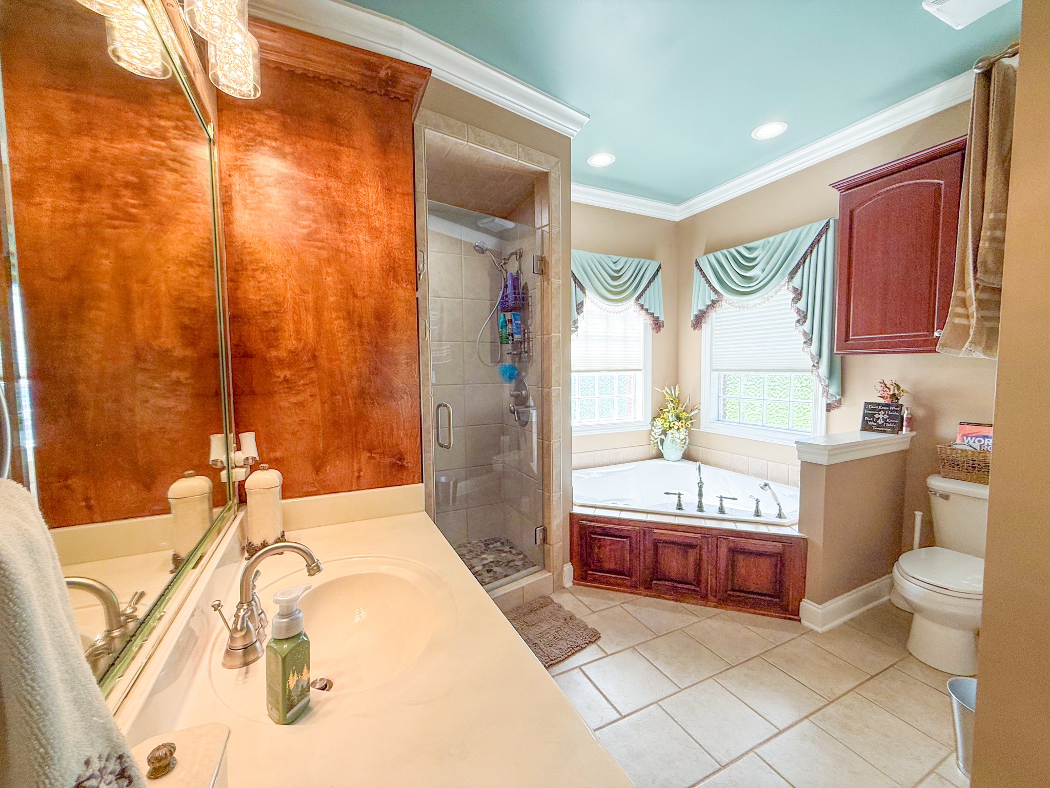 275 Crescentview Road Pulaski, TN 38478 - Photo 25 of 62 a spacious bathroom with a double vanity sink toilet and shower