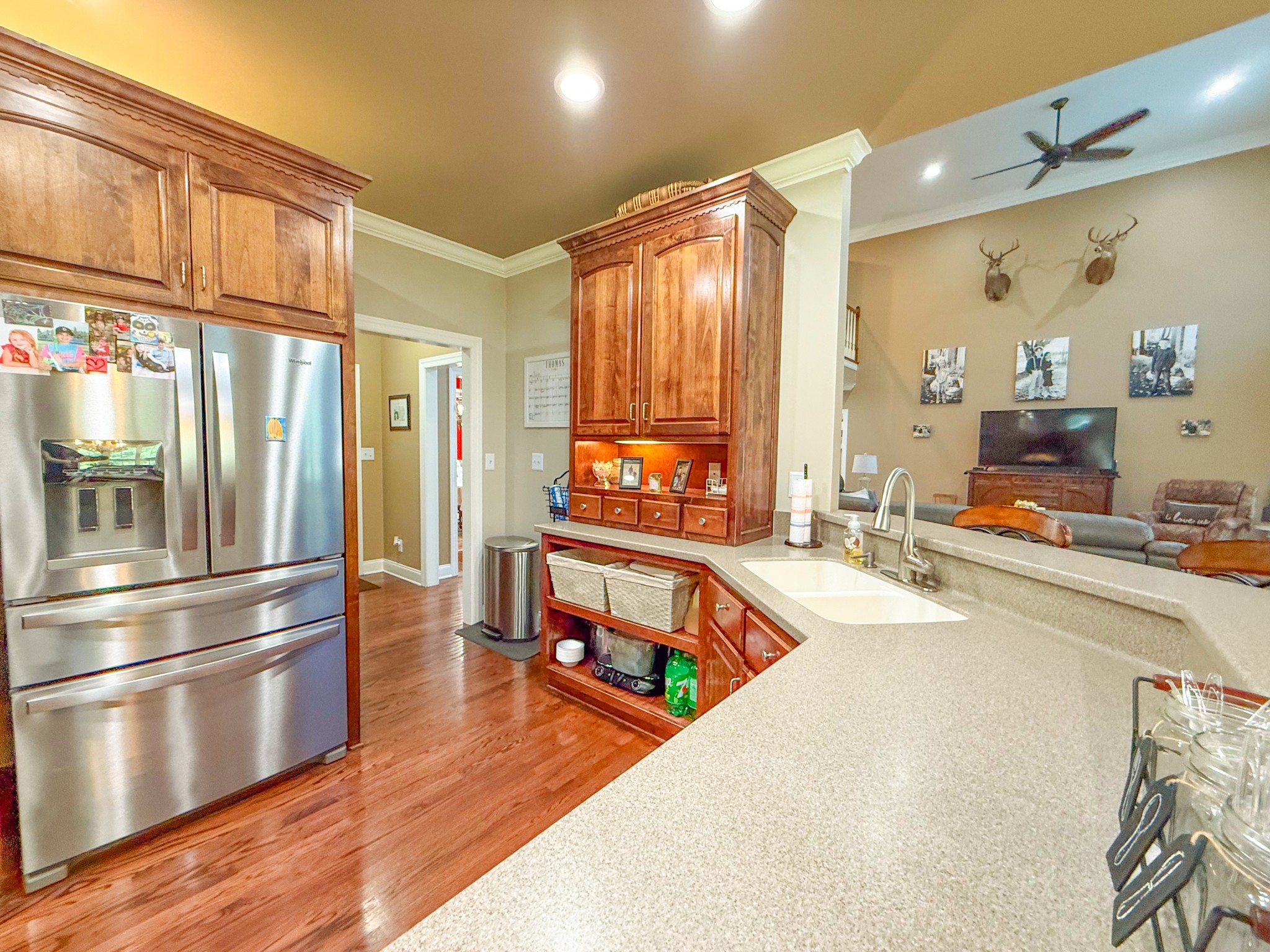 275 Crescentview Road Pulaski, TN 38478 - Photo 8 of 62 a kitchen with stainless steel appliances granite countertop a refrigerator a stove and a sink with wooden floor