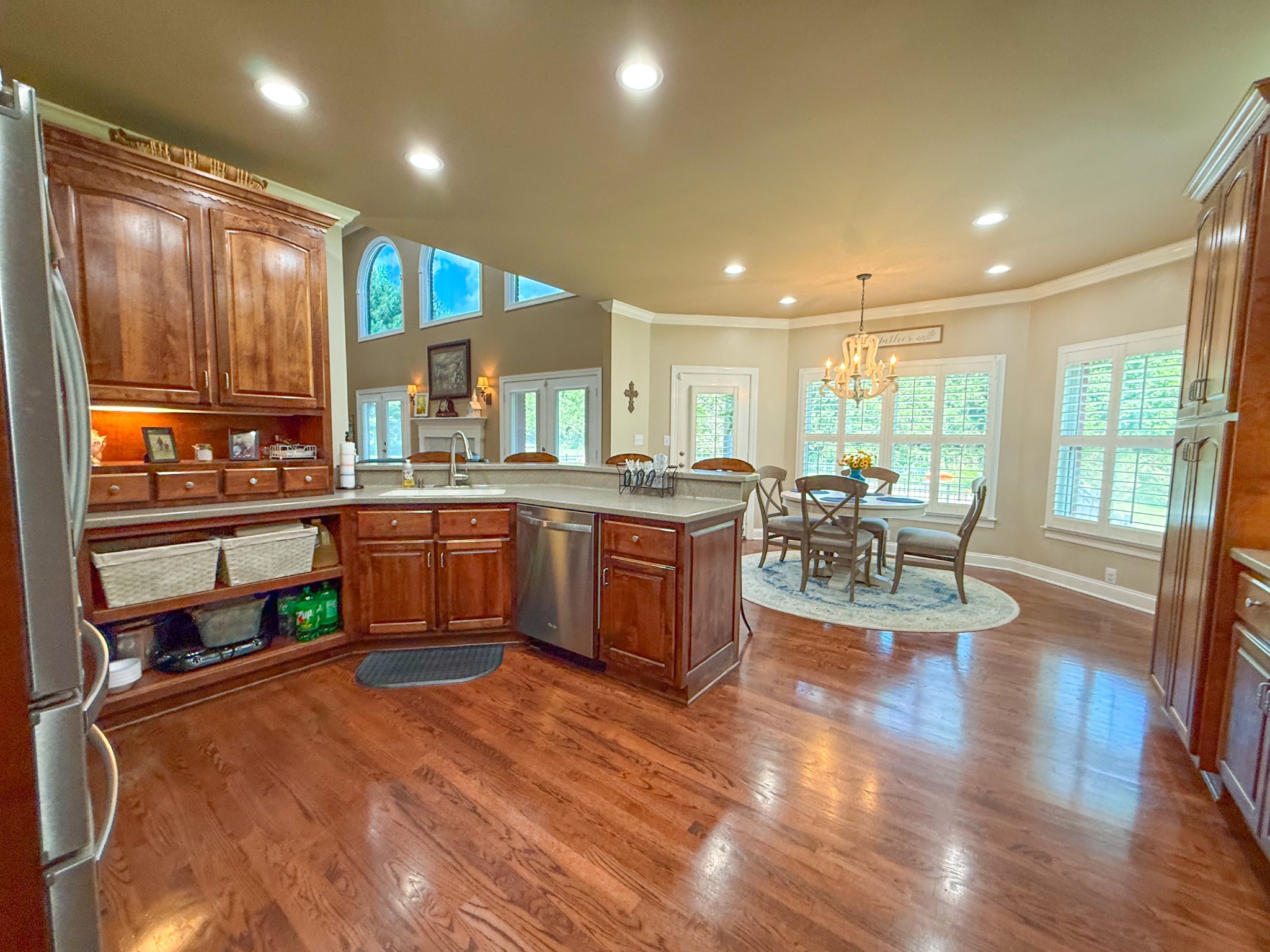 275 Crescentview Road Pulaski, TN 38478 - Photo 10 of 62 a kitchen with stainless steel appliances granite countertop sink stove and wooden cabinets