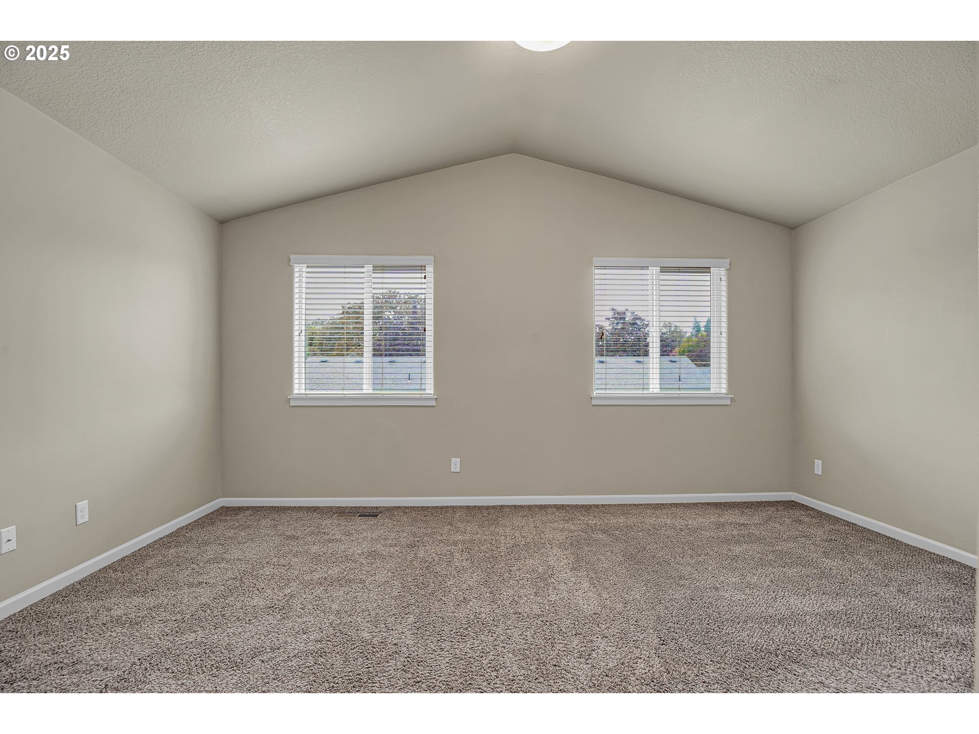 18370 Southwest Anna Mae Lane Beaverton, OR 97003 - Photo 14 of 29 a view of an empty room with a window