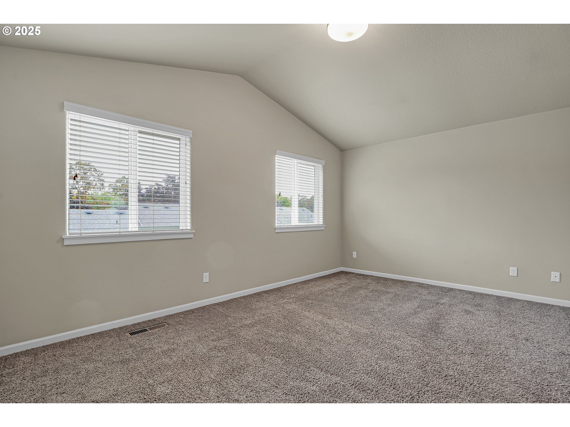 18370 Southwest Anna Mae Lane Beaverton, OR 97003 - Photo 15 of 29 a view of an empty room with a window