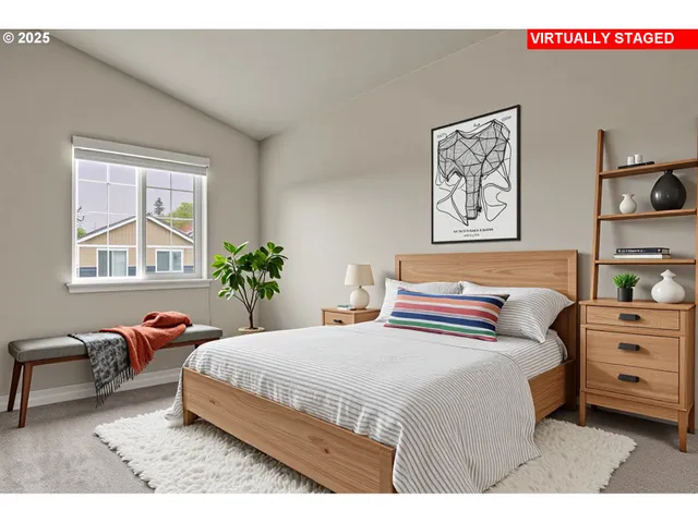 a bedroom with a bed a dresser and a window