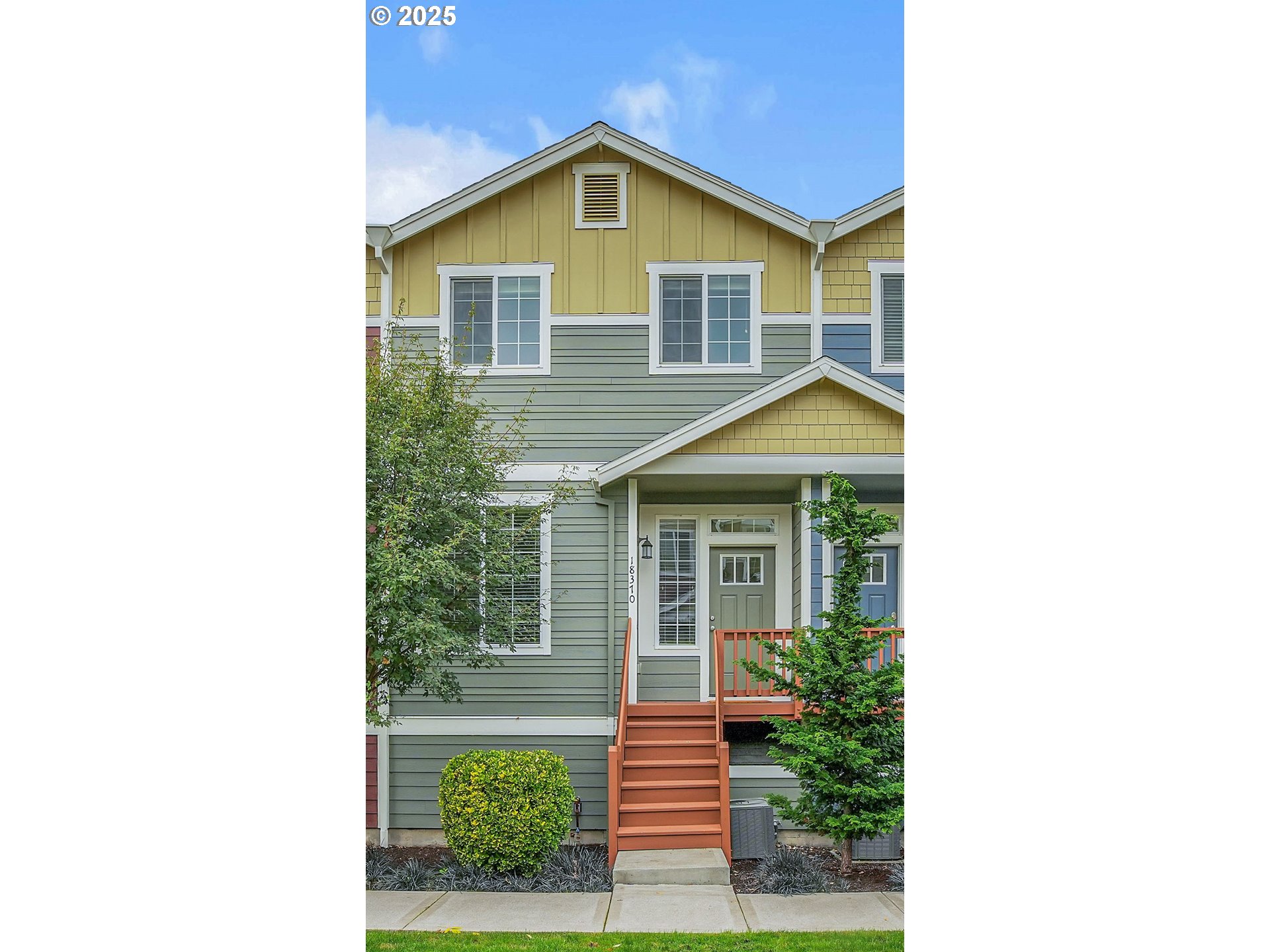 18370 Southwest Anna Mae Lane Beaverton, OR 97003 - Photo 2 of 29 a view of a house with a yard and potted plants