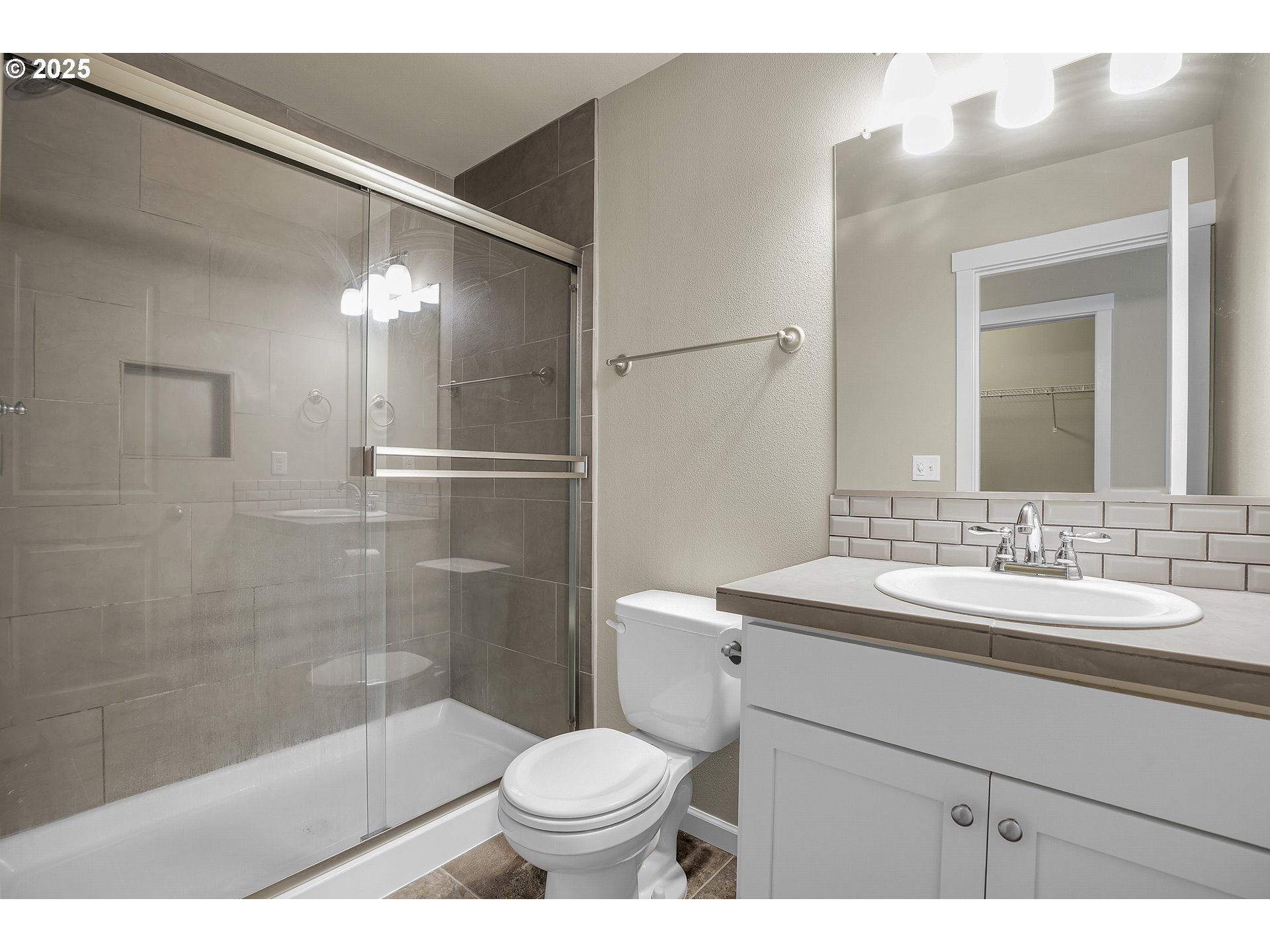 18370 Southwest Anna Mae Lane Beaverton, OR 97003 - Photo 21 of 29 a bathroom with a sink a toilet and shower