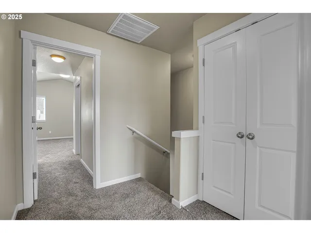 a view of a room with a wardrobe space